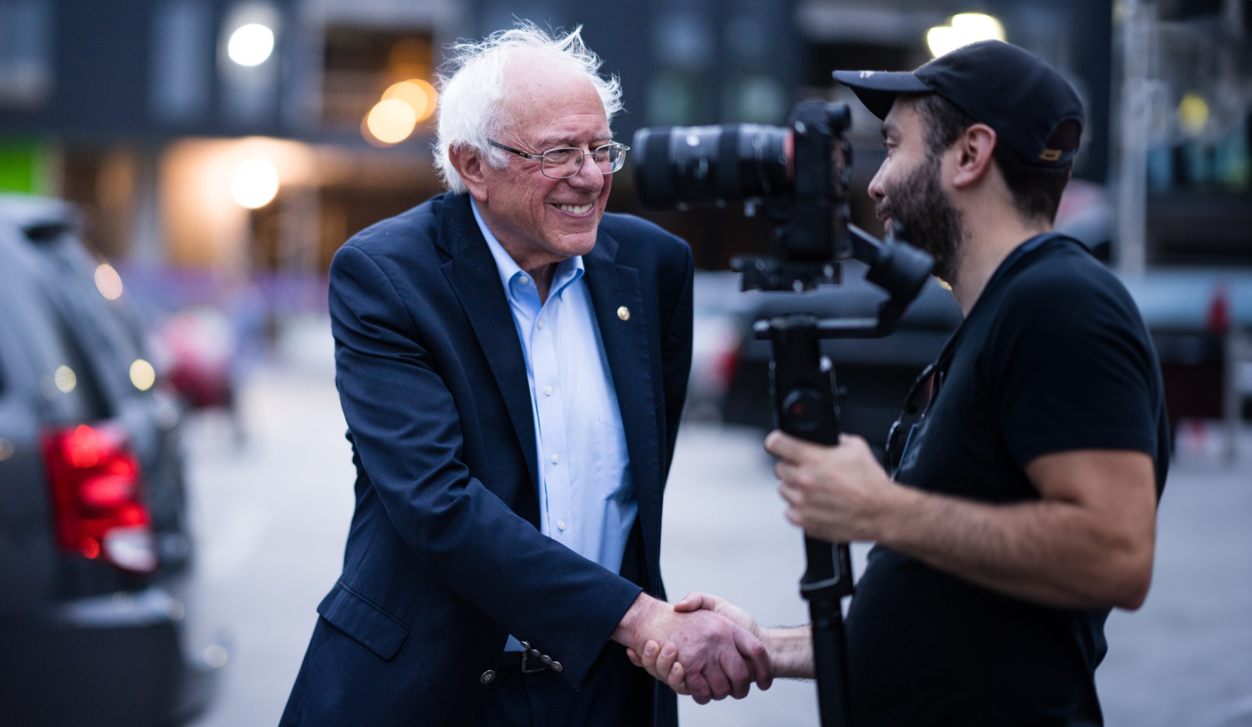 Bernie Sanders shaking hands